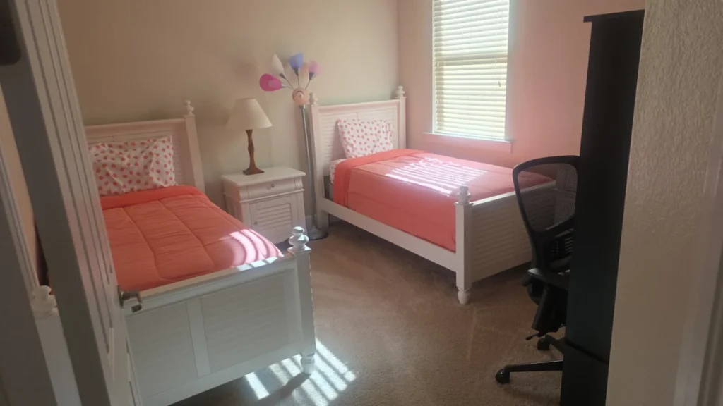 Clean twin bedroom after residential cleaning service